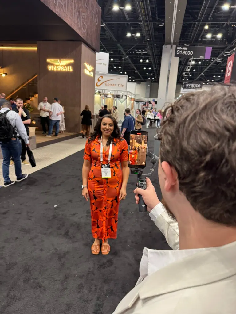 Exhibitor interview being filmed at KBIS with a smartphone gimbal